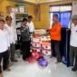 Penyerahan Bantuan Puting Beliung Desa Keliling Benteng Ilir Kec.Sungai Tabuk (FOTO : BPBD BANJAR)